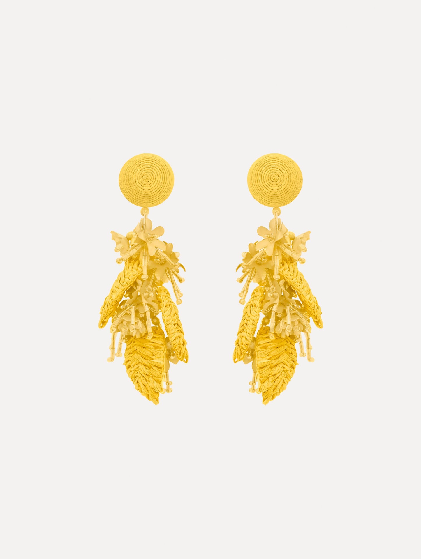 The Raffia Tassel Bouquet Clip-On Earrings in Yellow. Front View.
