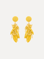 The Raffia Tassel Bouquet Clip-On Earrings in Yellow. Front View.
