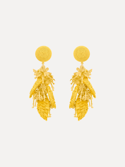 The Raffia Tassel Bouquet Clip-On Earrings in Yellow. Front View.