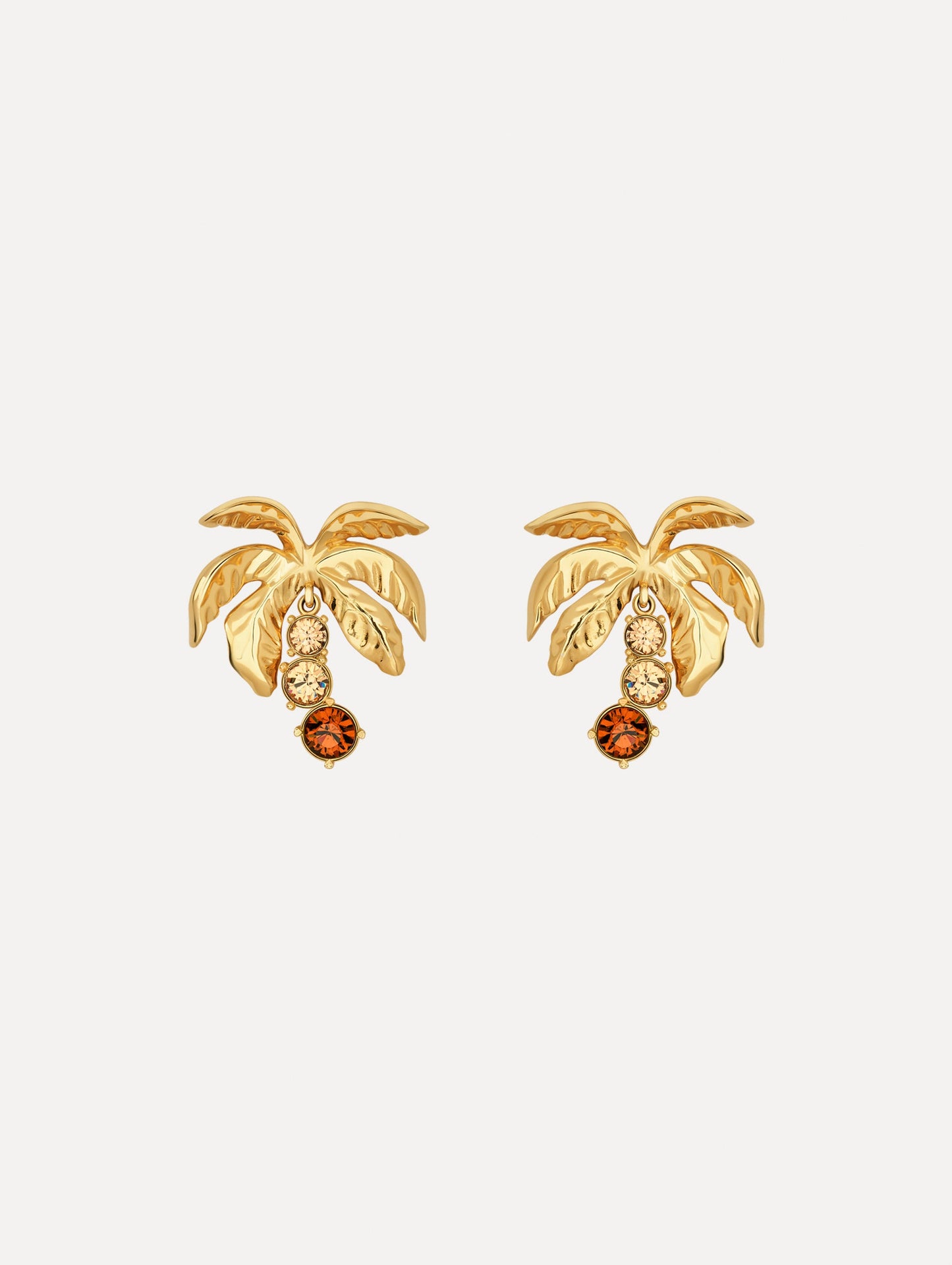 The Palm Tree Crystal Clip-On Earrings in Gold with Crystal Trunks. Front View.