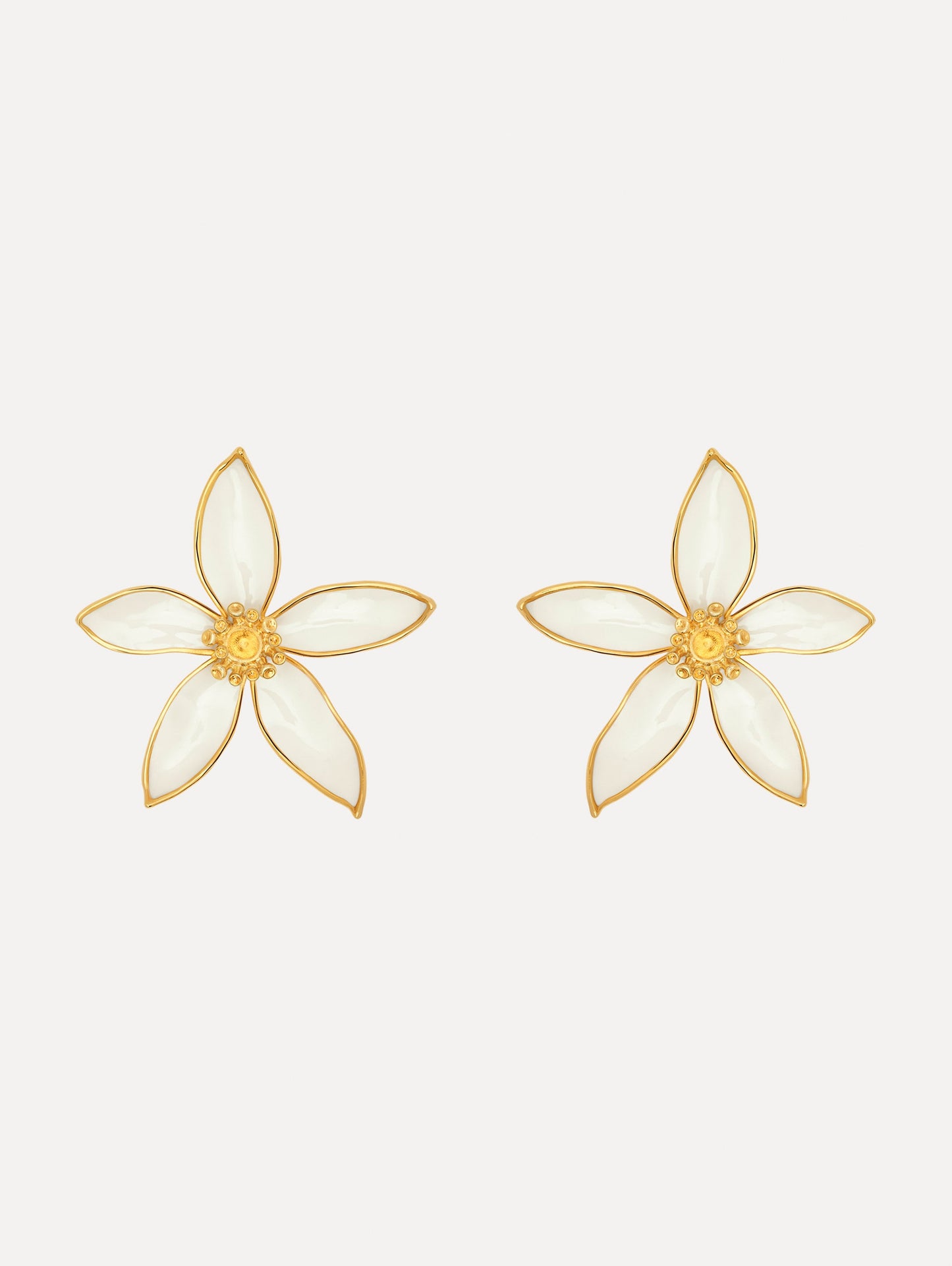 The Orange Blossom Clip-On Earrings in White. Front View.