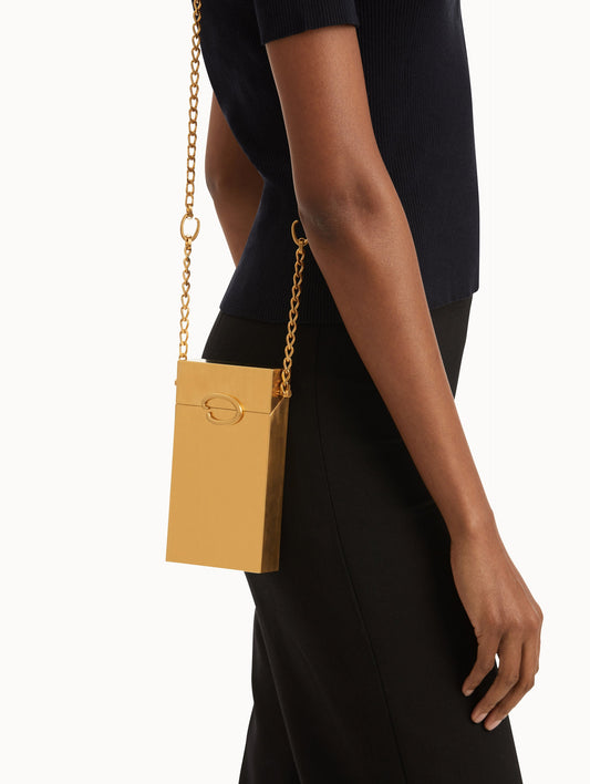 Gold O Vanity Minaudière with structured silhouette and adorned with Oscar de la Renta's 'O' emblems at the clasp and chain-link details. Front View