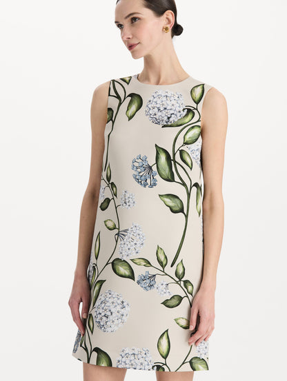 The model is wearing the Porcelain Flower Faille Shift Dress in white featuring a mini-length and printed floral motif. Detail Shot.