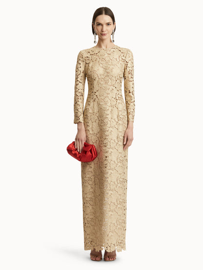 Gold Foil Rose Guipure Gown with Long Sleeves Paired with Red Satin Clutch Front View