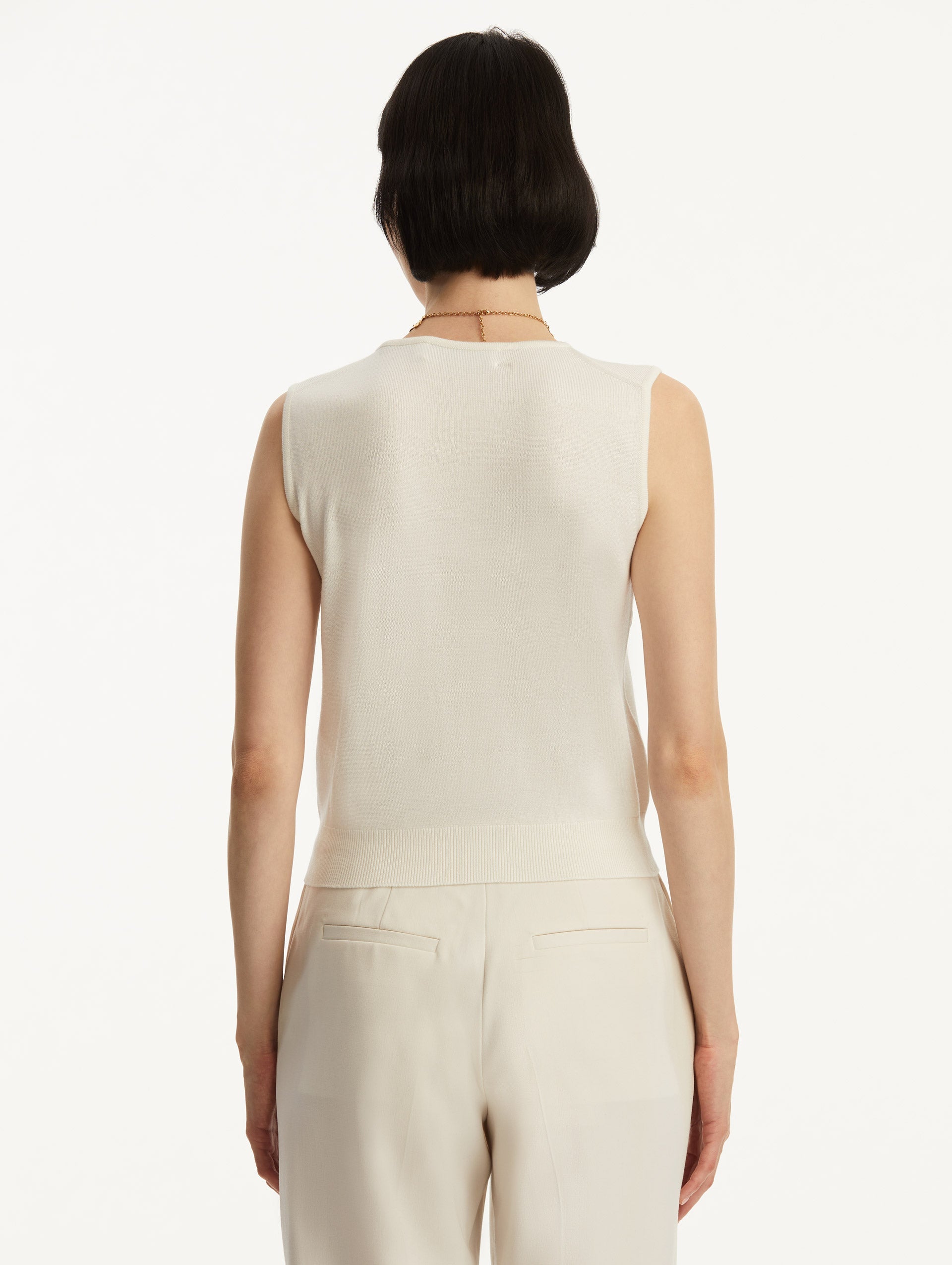 Wool-Blend Ivory Tank Styled with White Pants Back View