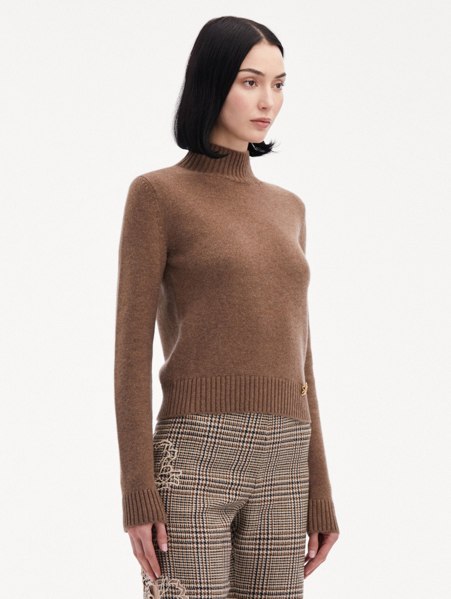 Brown O Flower Mock Neck Cashmere Pullover Paired with Plaid Pants Side View