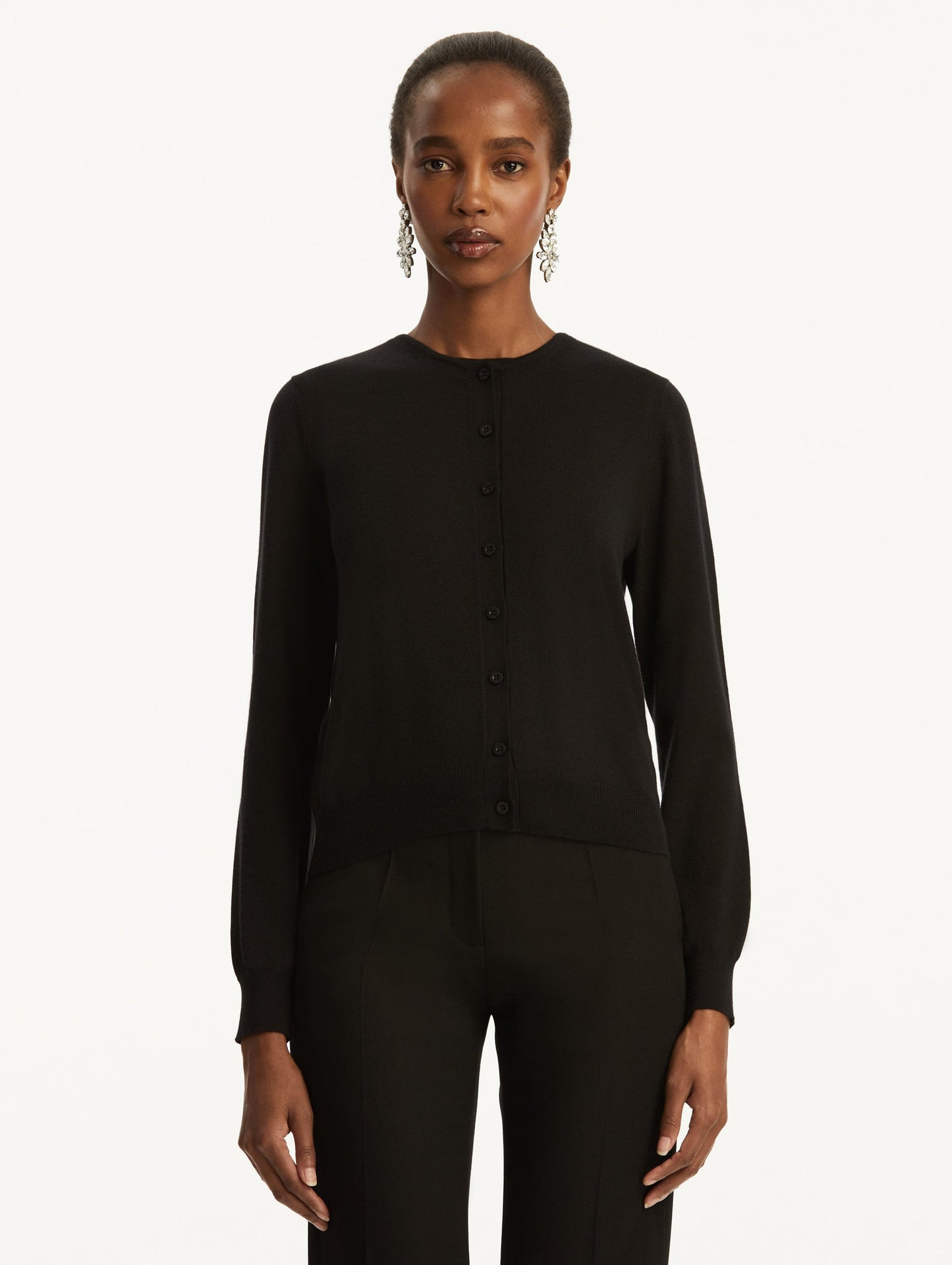 Wool-Blend Black Button-Down Cardigan Styled with Black Pants Front View