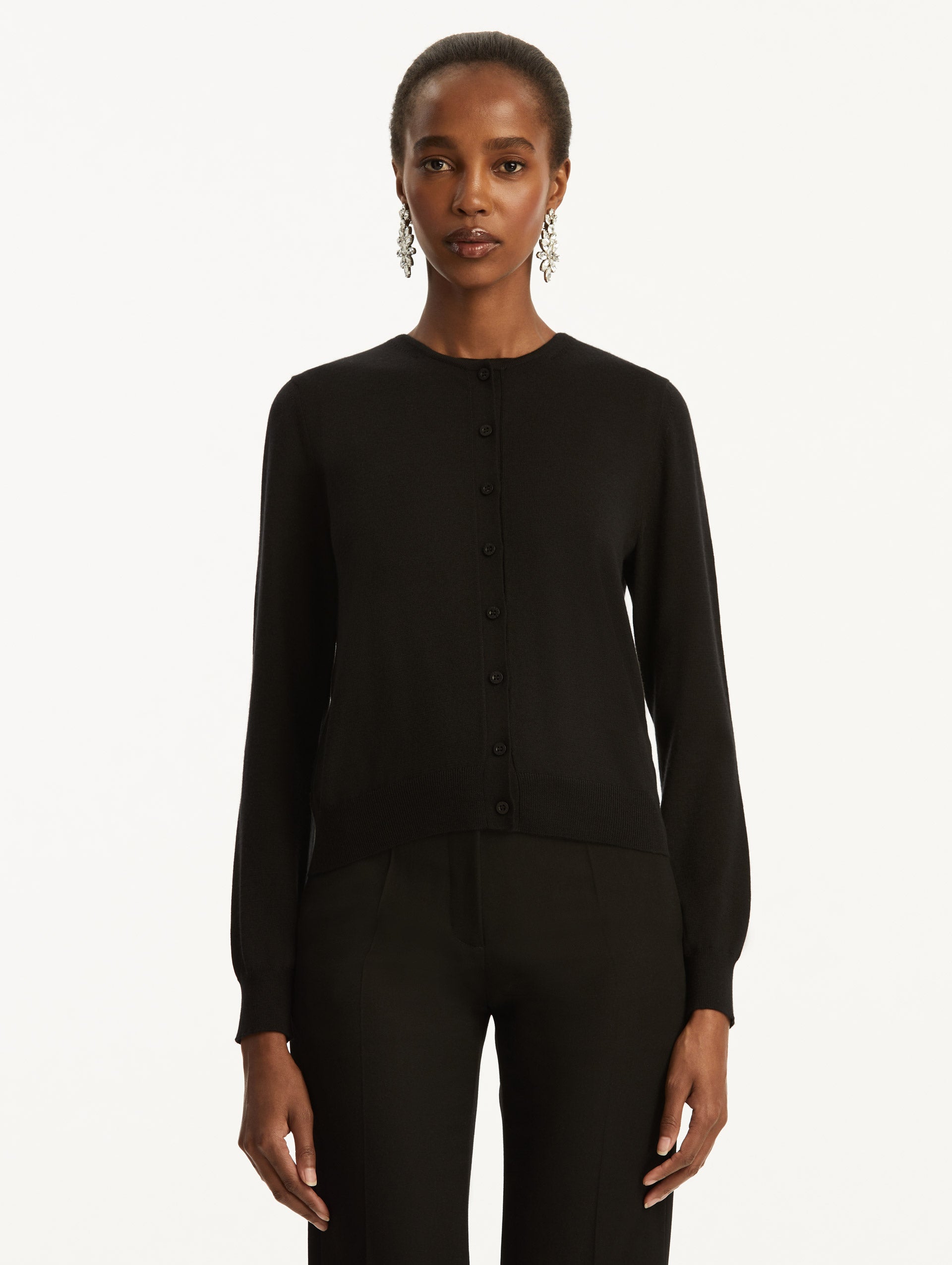 Wool-Blend Black Button-Down Cardigan Styled with Black Pants Front View