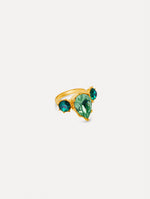 Gold Faceted Crystal Ring featuring a central pear-shaped green gemstone flanked by two round emerald-green stones.
