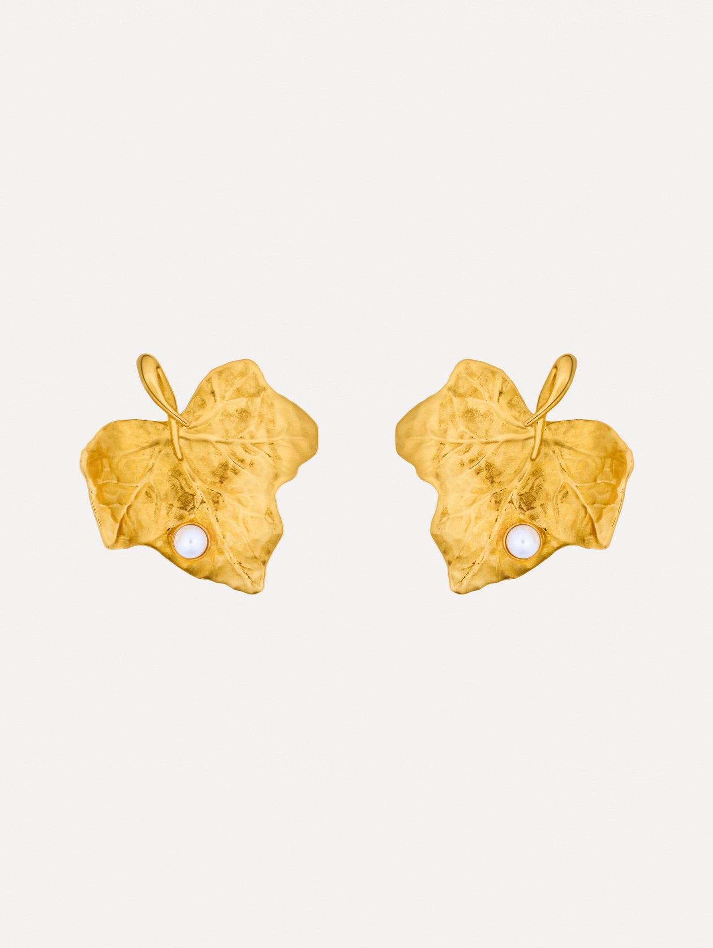 Gold Ivy Leaf Earrings featuring a textured finish and accented with a single small pearl at the base.