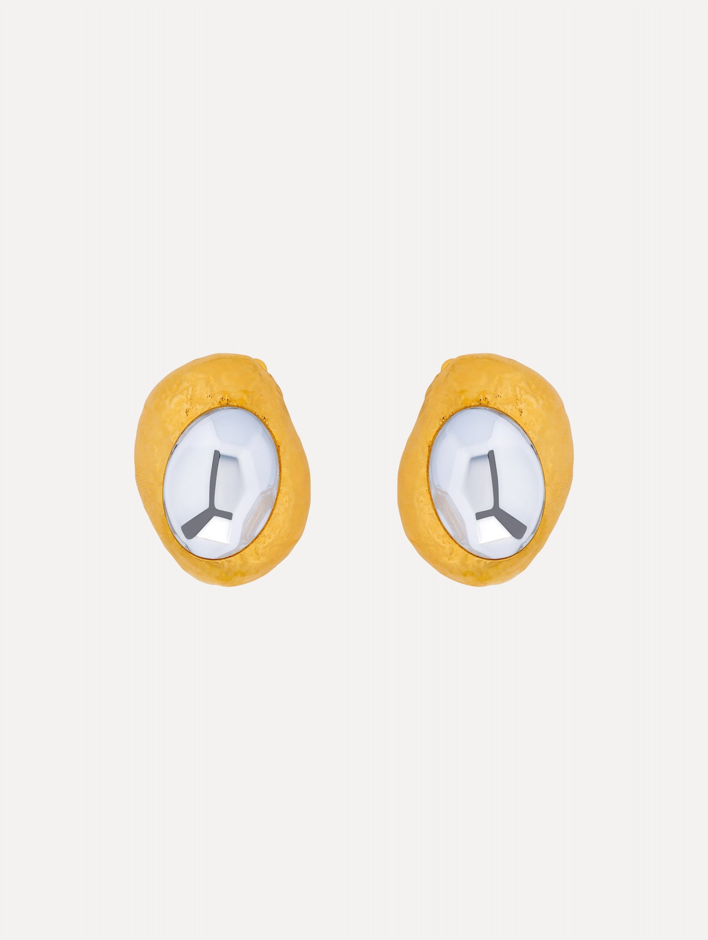 Gold Hammered Oval Clip-On Earrings featuring round textured frames with faceted silver-tone centers.