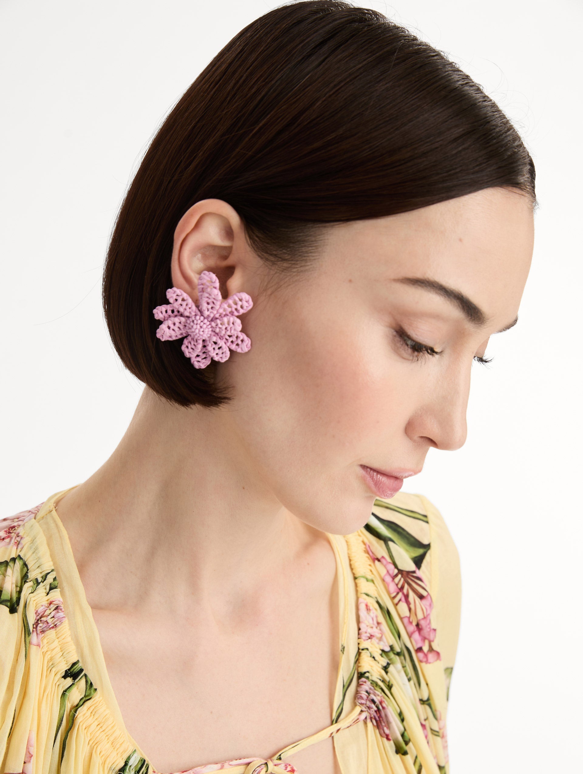 Pink Large Woven Raffia Flower Earrings with pink raffia in a flower shape. Front View.