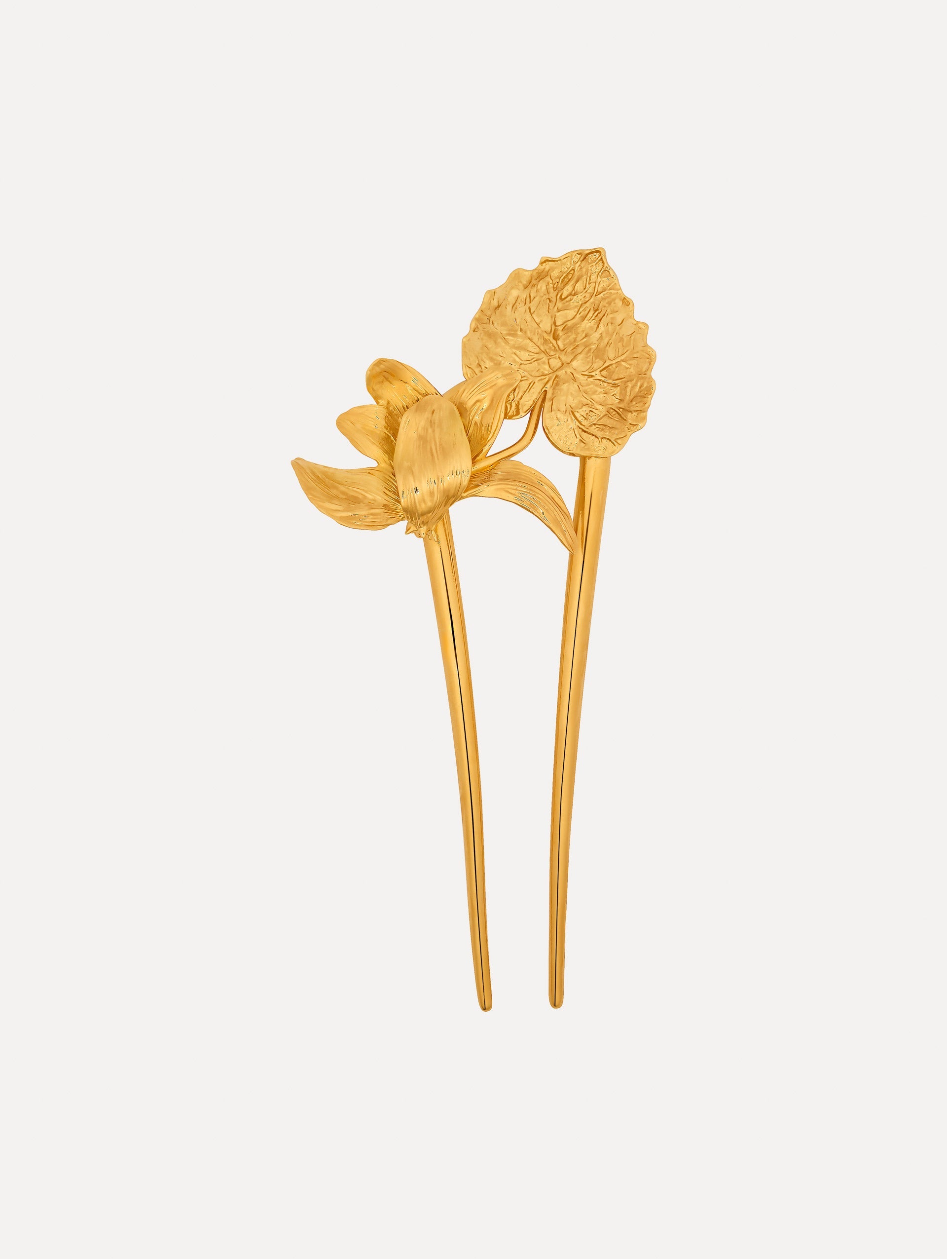 Cyclamen Hairpin in the color gold with flower petal and leaf structure.