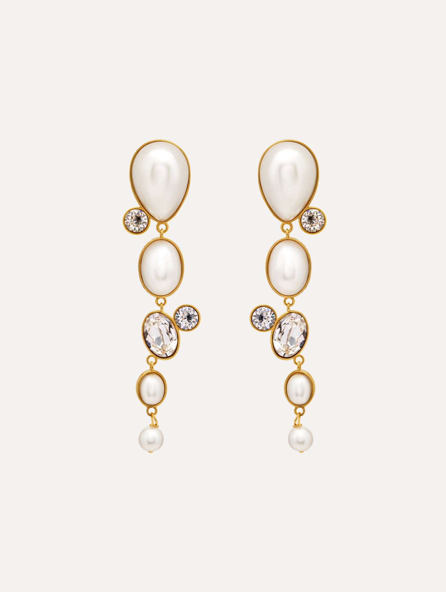 Pearls & Rhinestones Drop Clip-On Earrings with four pearls and three crystals cascading down. Front View.