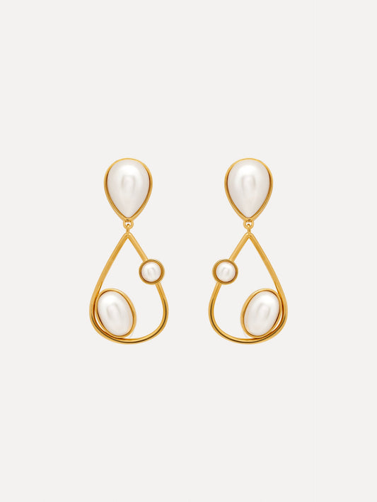 Pearl Cabochon Drop Clip-On Earrings with three pearls and a gold pear shaped drop. Front View.
