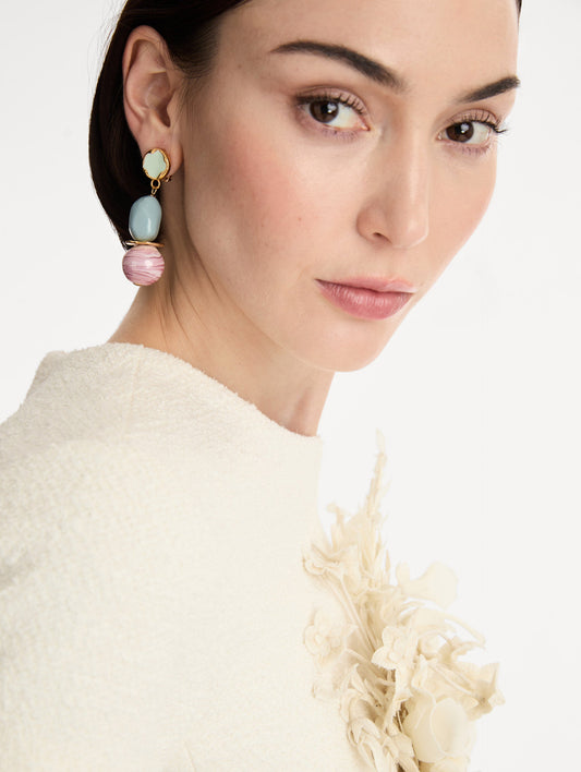 Gold Sea Glass Drop Clip-On Earrings with green studs, stacked blue beads, and marbled pink orb pendants. Front View.