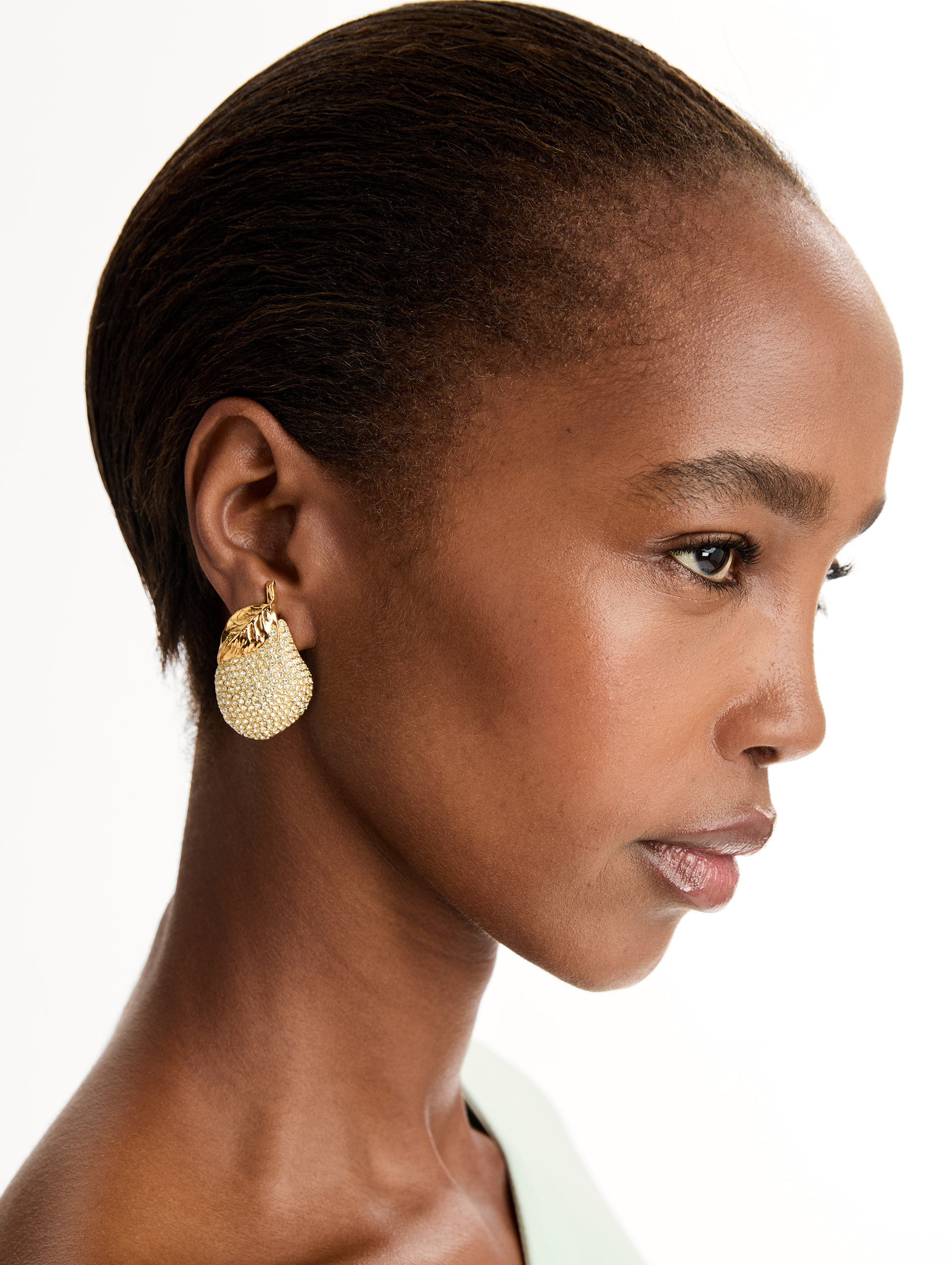 Gold Pavé Pear Earrings encrusted with clear crystals. Side View.