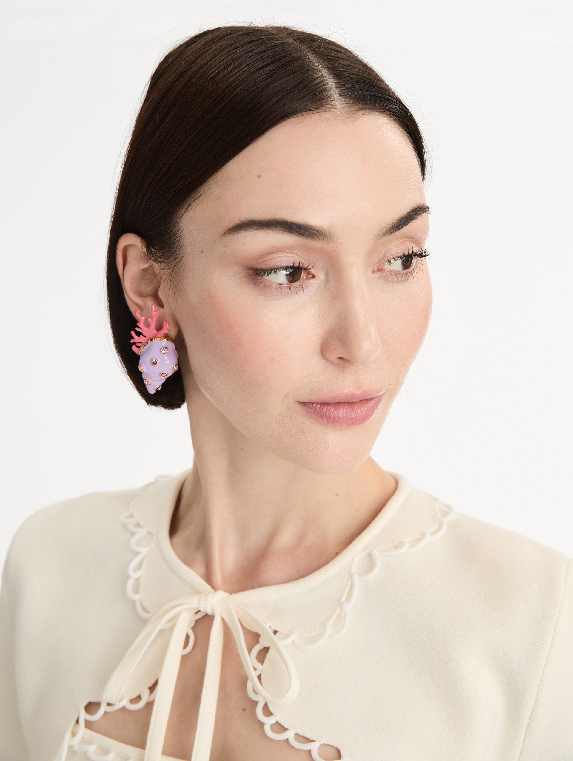 Lavender Seashell and Coral Earrings with pink crystal accents and bold red coral detailing. Side View.