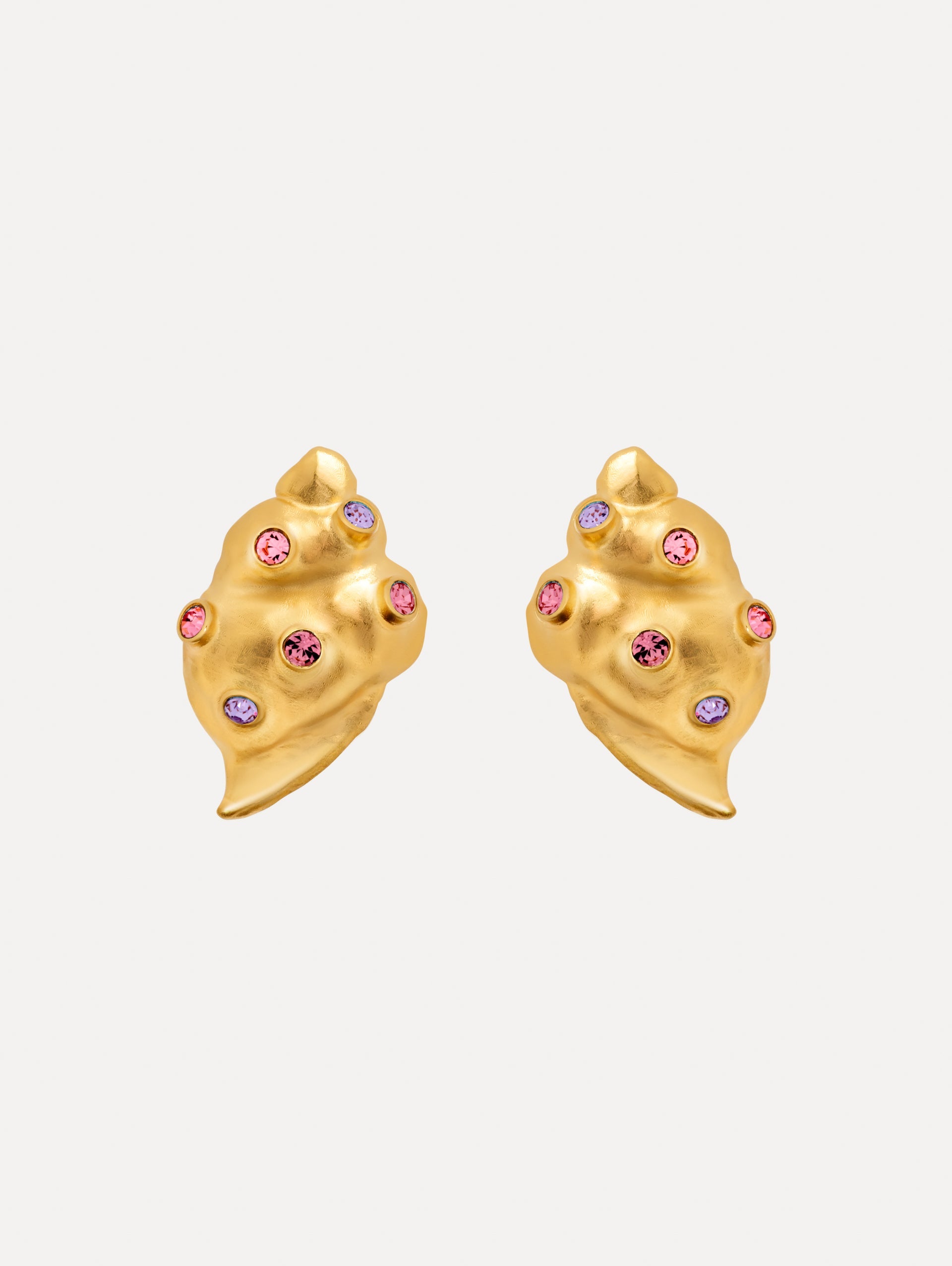Gold Seashell Earrings with gold and purple gemstones. Side View.