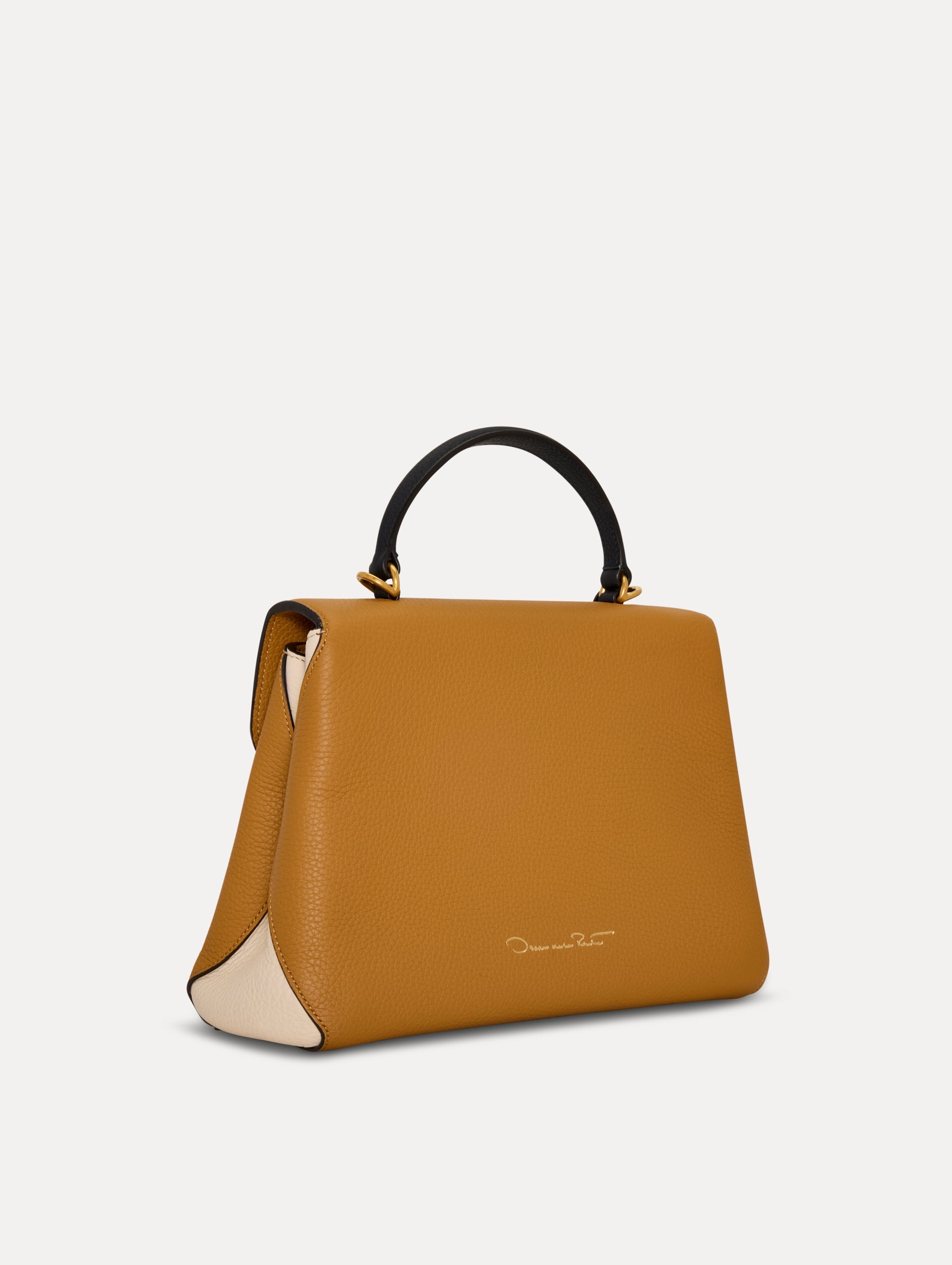 The Poppy Handbag in Honey with Black Top Handle. Side View