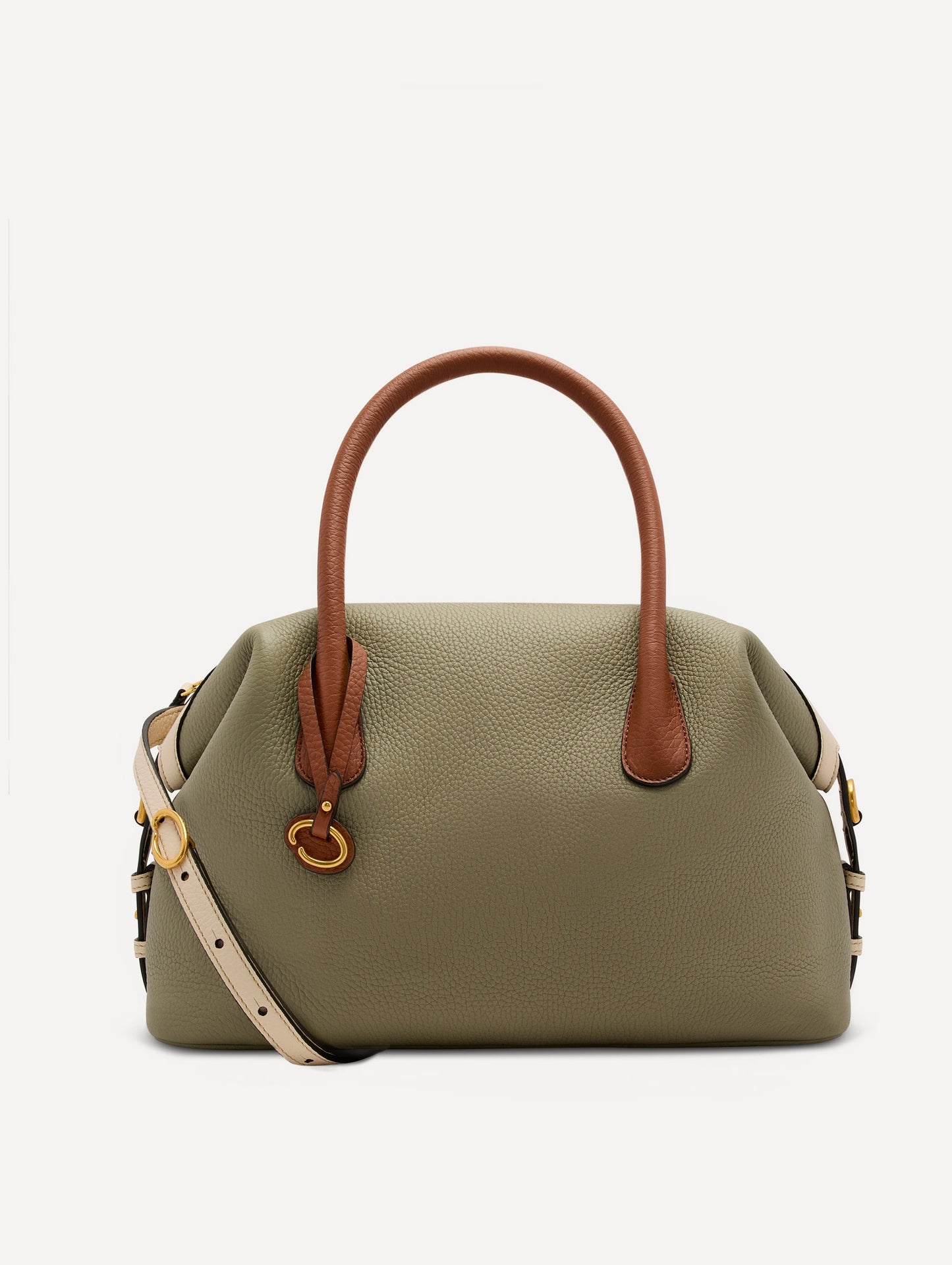Light green bag, with cognac handle, white crossbody strap, and gold Oscar logo in the handle. Front View.